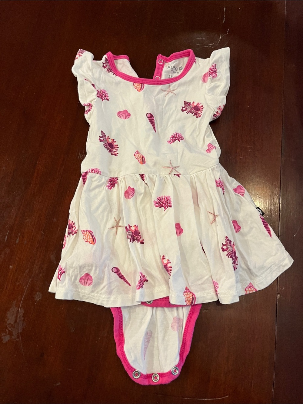 Kyte BABY White Dress Bodysuit with Pink Seashell Print